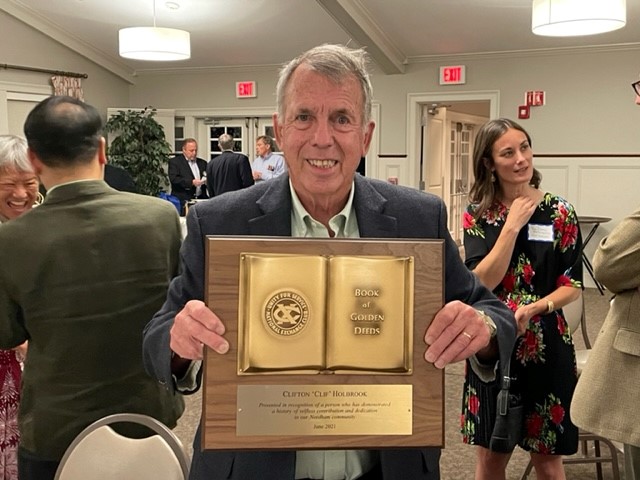 Clif Holding His Award