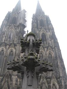 A copy of the top of the spire is mounted on the ground