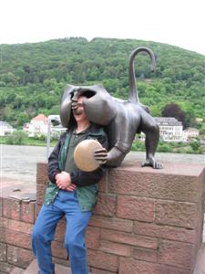 Fred playing dumb tourist with a brass monkey