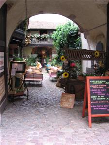 Peering into a square where more shops await