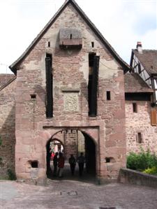 The ancient fortification at the far end of the village