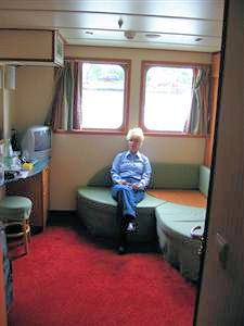 Our stateroom during the day.  Beds pulled down from the right at night.